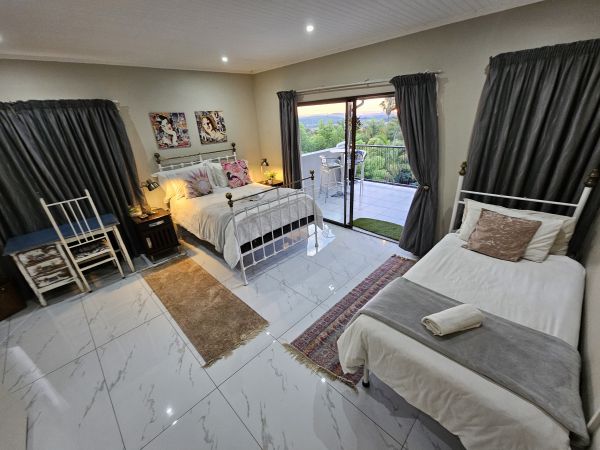 Sunset 1. Family Room. Queen and a single bed. Ensuite Bathroom